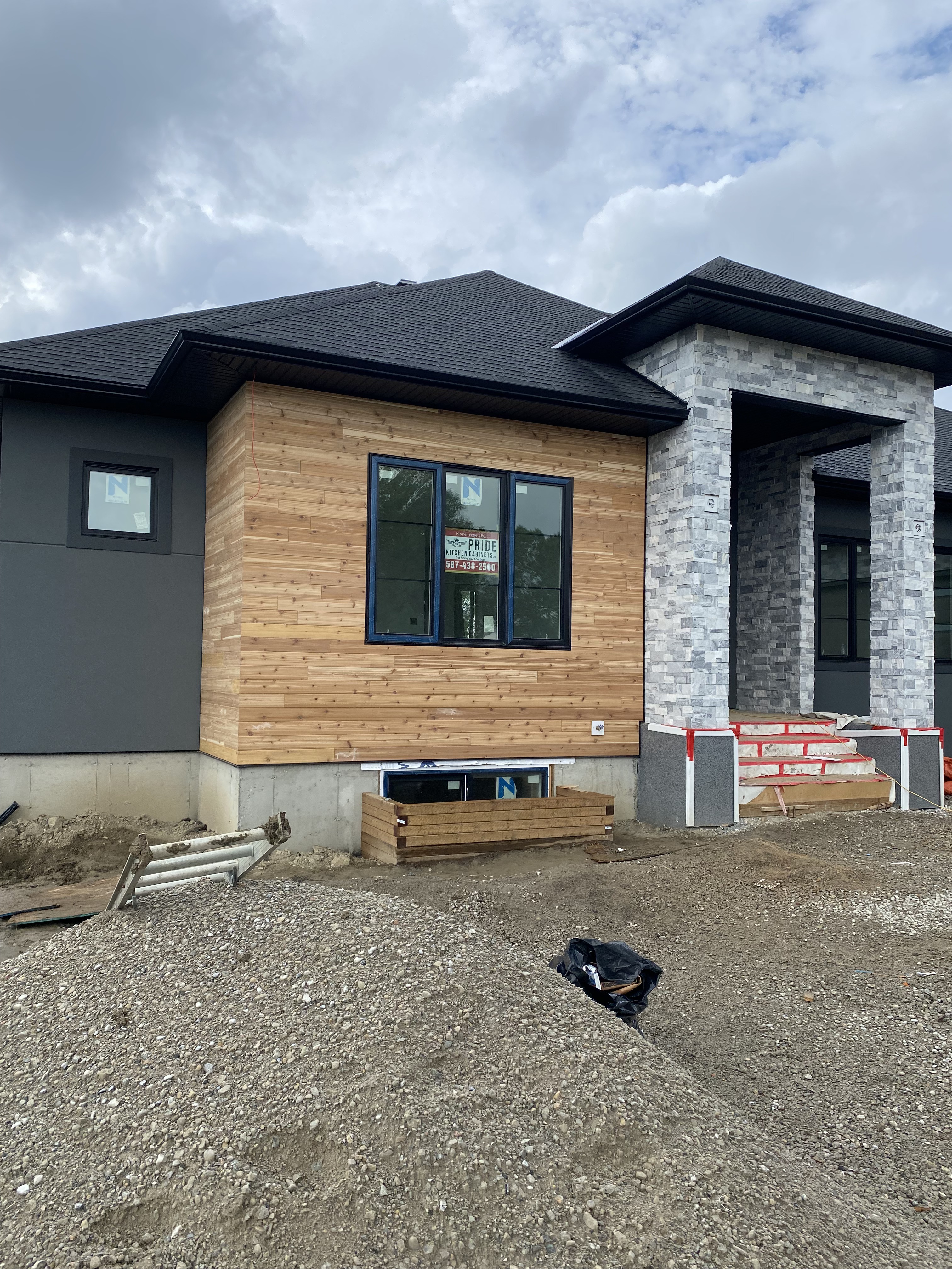 Cedar wood siding accent on bungalow
