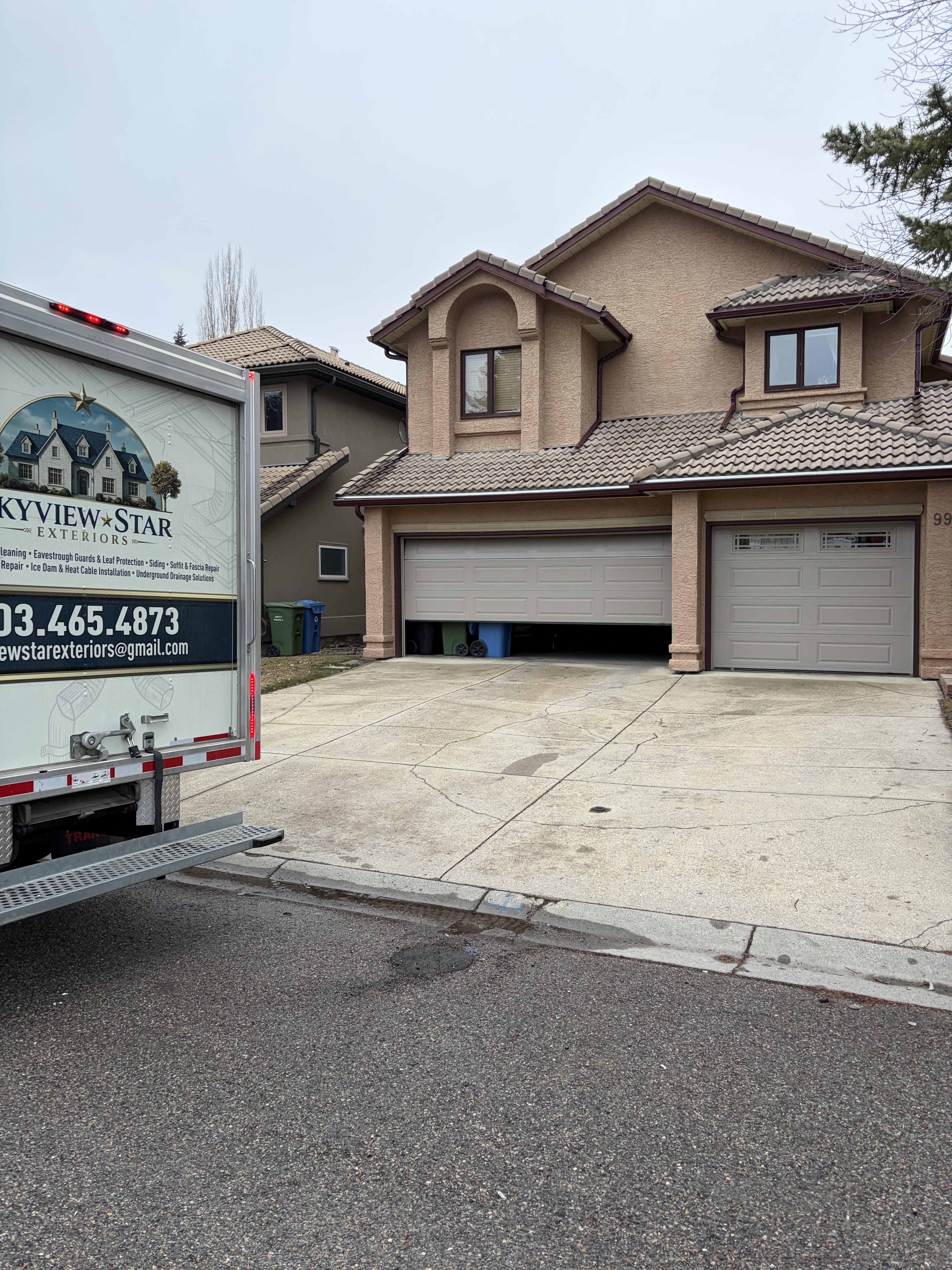 Skyview Star Exteriors truck at a Calgary stucco home
