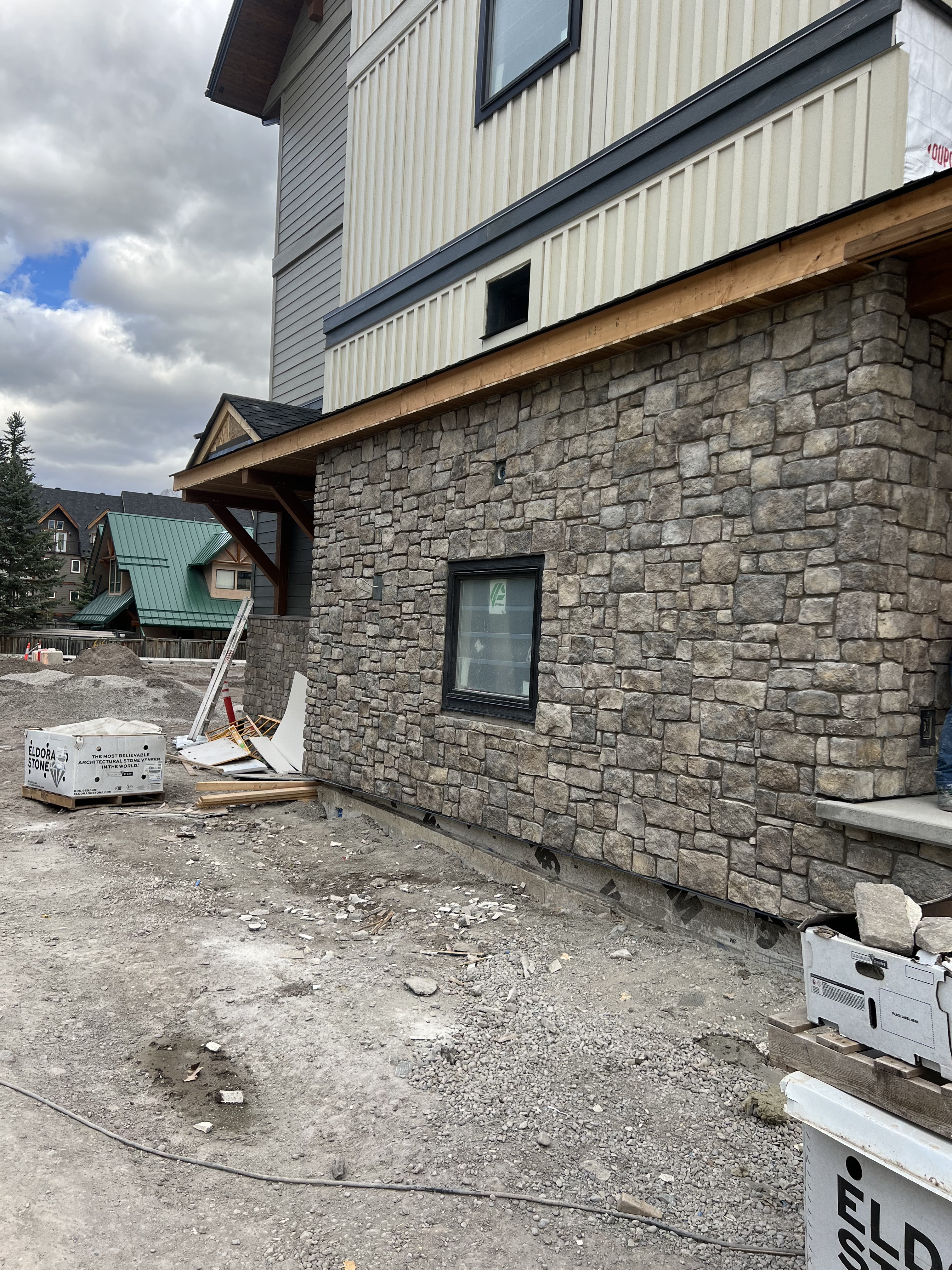 Stone wainscot on mountain modern home